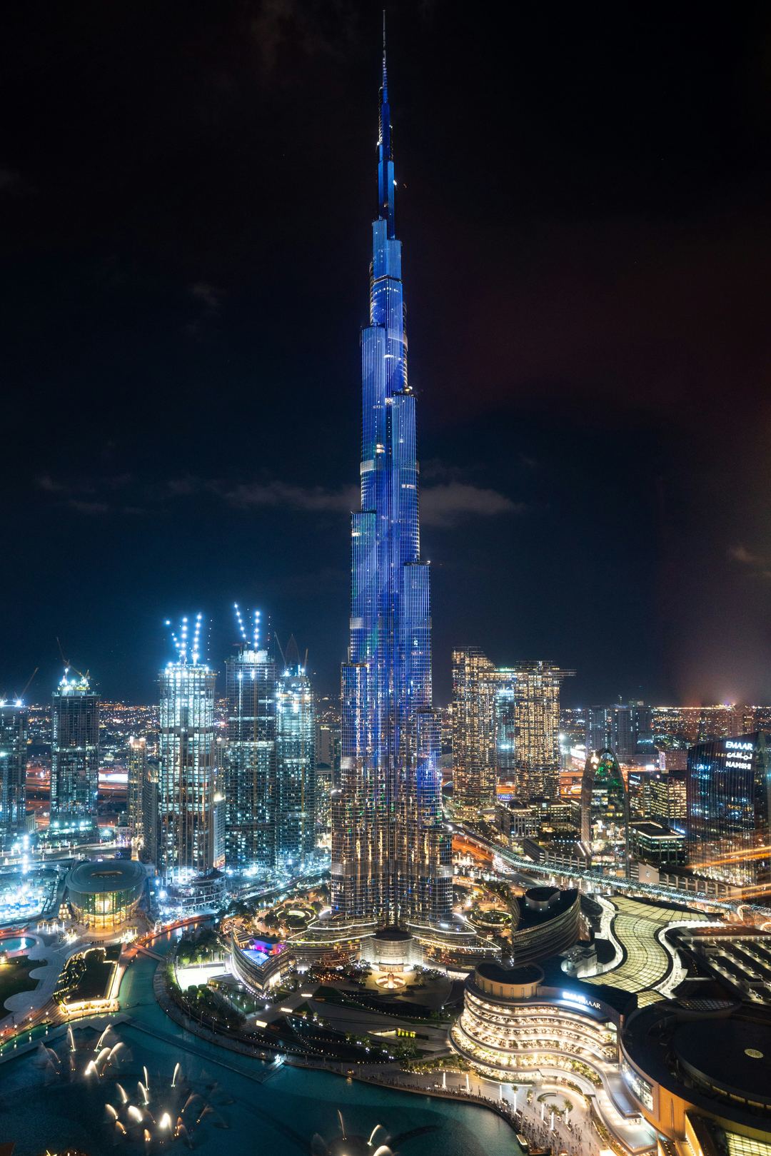 Dubai skyline at dusk with the Burj Khalifa lit up